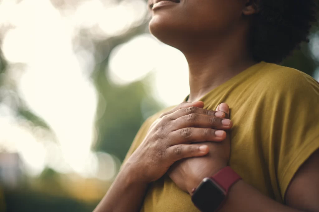 Person expressing gratitude and personal growth